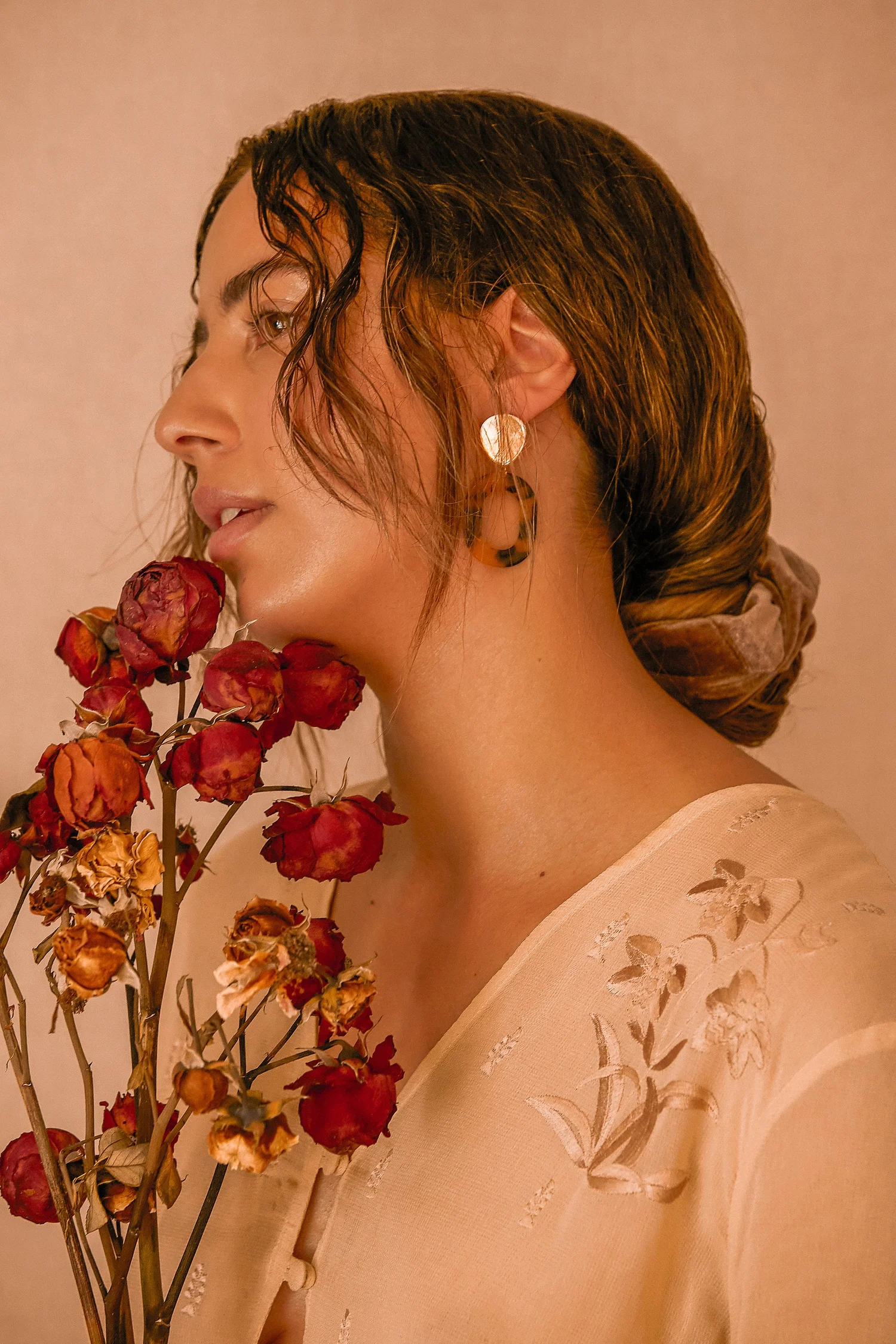Wet-look studio editorial portrait
